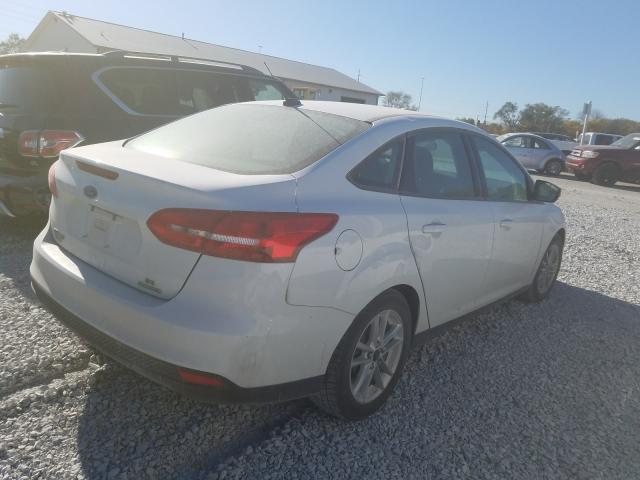 Photo 3 VIN: 1FADP3F22GL208905 - FORD FOCUS 