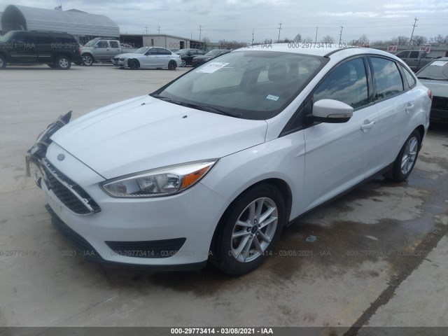 Photo 1 VIN: 1FADP3F22GL214168 - FORD FOCUS 