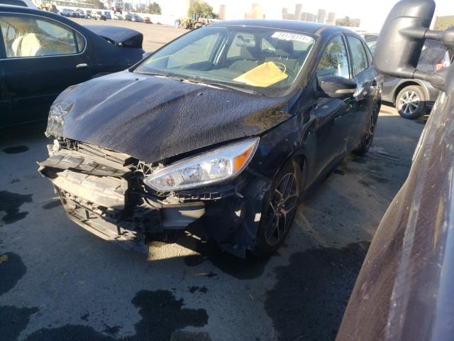 Photo 1 VIN: 1FADP3F22GL230581 - FORD FOCUS SE 