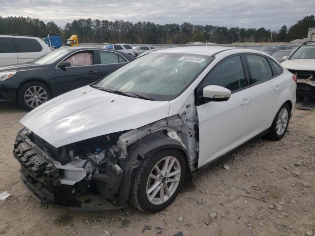 Photo 1 VIN: 1FADP3F22GL233609 - FORD FOCUS SE 