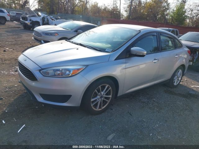 Photo 1 VIN: 1FADP3F22GL262236 - FORD FOCUS SE 