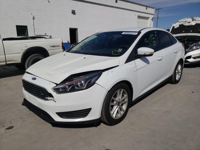 Photo 1 VIN: 1FADP3F22GL268196 - FORD FOCUS SE 