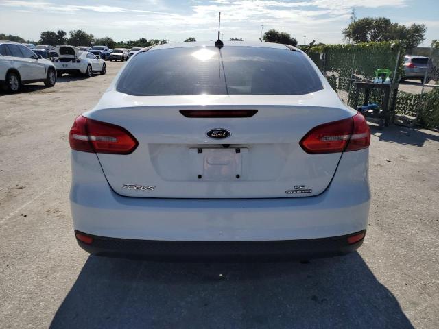 Photo 5 VIN: 1FADP3F22GL272314 - FORD FOCUS 