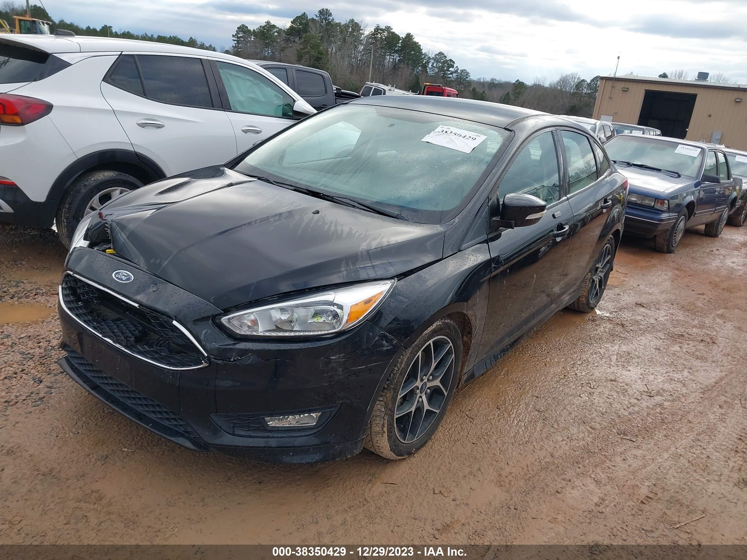 Photo 1 VIN: 1FADP3F22GL274239 - FORD FOCUS 