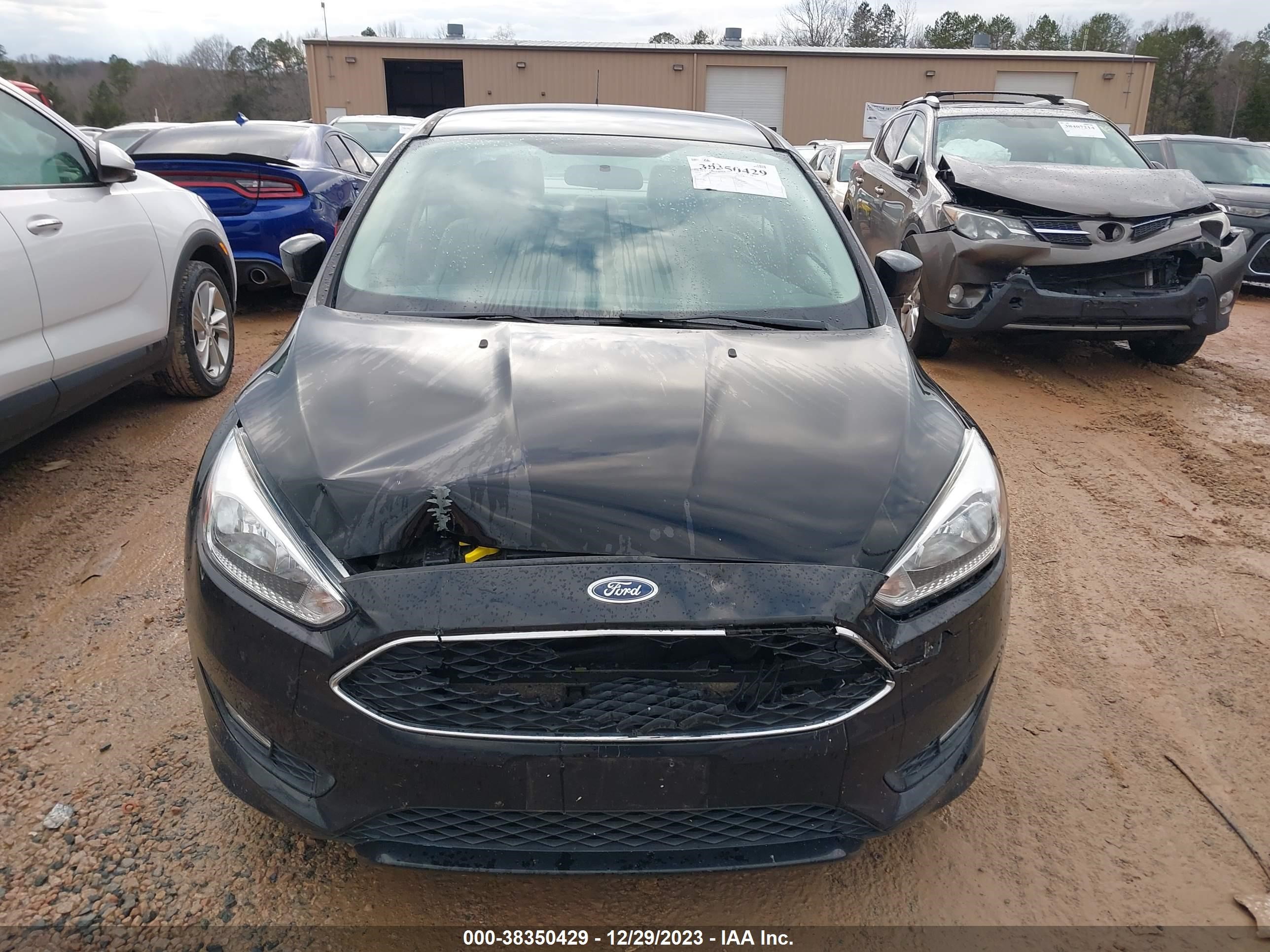 Photo 11 VIN: 1FADP3F22GL274239 - FORD FOCUS 