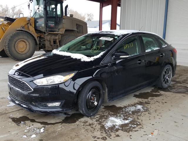 Photo 1 VIN: 1FADP3F22GL282826 - FORD FOCUS 