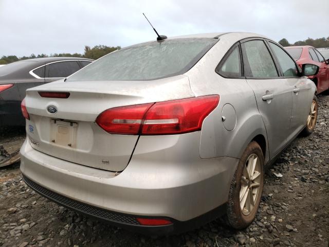 Photo 3 VIN: 1FADP3F22GL286598 - FORD FOCUS 