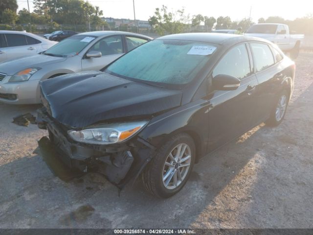 Photo 1 VIN: 1FADP3F22GL292692 - FORD FOCUS 