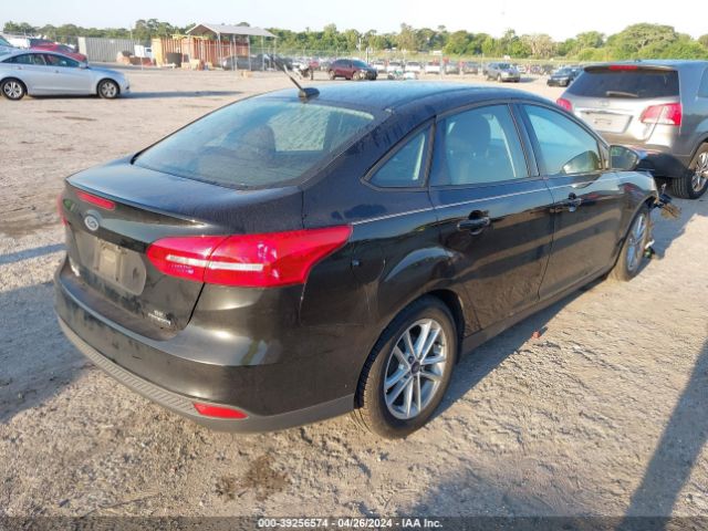 Photo 3 VIN: 1FADP3F22GL292692 - FORD FOCUS 