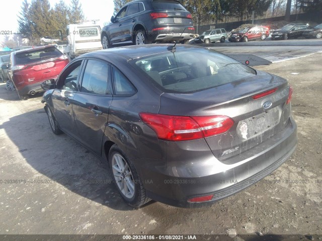 Photo 2 VIN: 1FADP3F22GL299769 - FORD FOCUS 