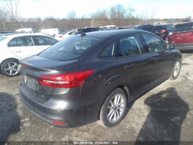 Photo 3 VIN: 1FADP3F22GL299769 - FORD FOCUS 