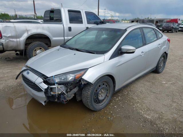 Photo 1 VIN: 1FADP3F22GL303027 - FORD FOCUS 