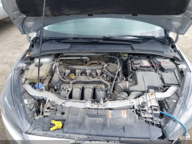 Photo 9 VIN: 1FADP3F22GL303027 - FORD FOCUS 