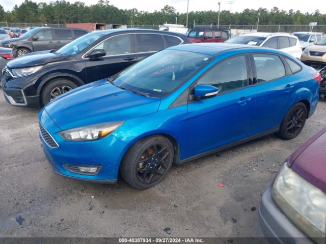 Photo 1 VIN: 1FADP3F22GL309717 - FORD FOCUS 