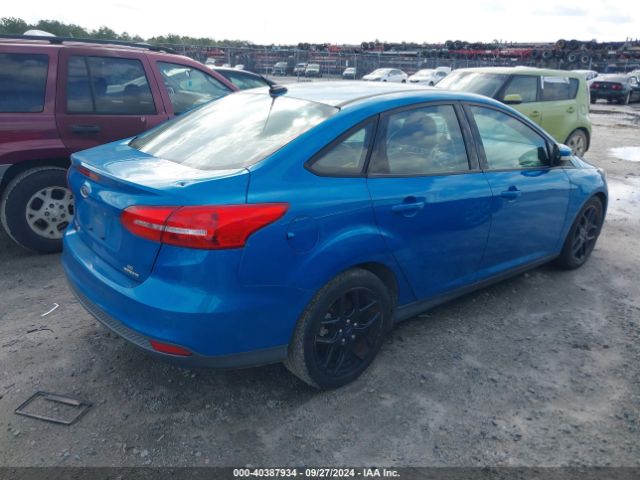 Photo 3 VIN: 1FADP3F22GL309717 - FORD FOCUS 