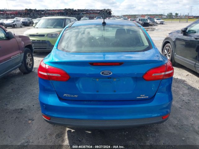 Photo 5 VIN: 1FADP3F22GL309717 - FORD FOCUS 