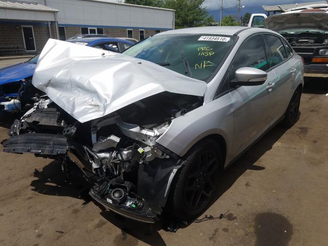 Photo 1 VIN: 1FADP3F22GL320992 - FORD FOCUS SE 