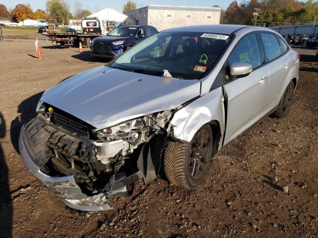 Photo 1 VIN: 1FADP3F22GL321219 - FORD FOCUS SE 