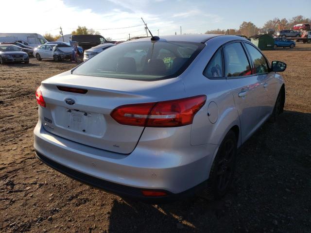 Photo 3 VIN: 1FADP3F22GL321219 - FORD FOCUS SE 