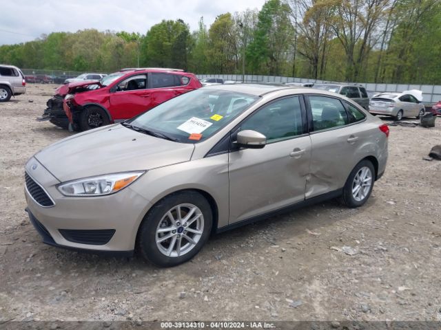 Photo 1 VIN: 1FADP3F22GL328011 - FORD FOCUS 