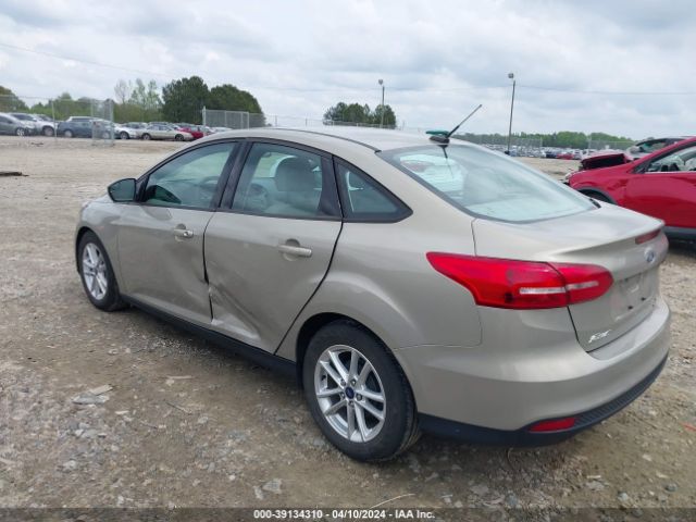 Photo 2 VIN: 1FADP3F22GL328011 - FORD FOCUS 