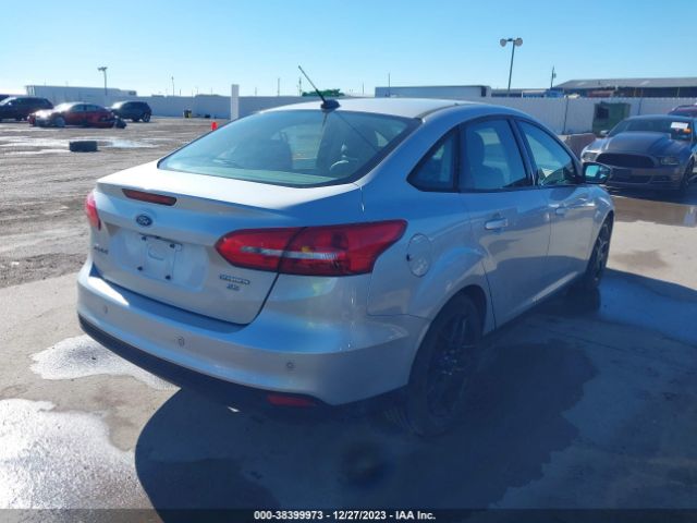 Photo 3 VIN: 1FADP3F22GL332303 - FORD FOCUS 