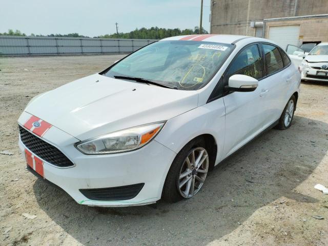 Photo 1 VIN: 1FADP3F22GL338103 - FORD FOCUS SE 