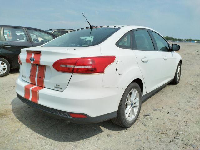 Photo 3 VIN: 1FADP3F22GL338103 - FORD FOCUS SE 