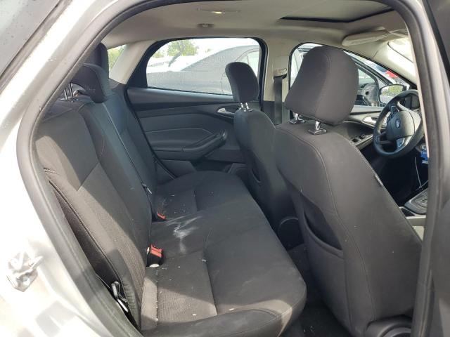 Photo 9 VIN: 1FADP3F22GL338358 - FORD FOCUS SE 