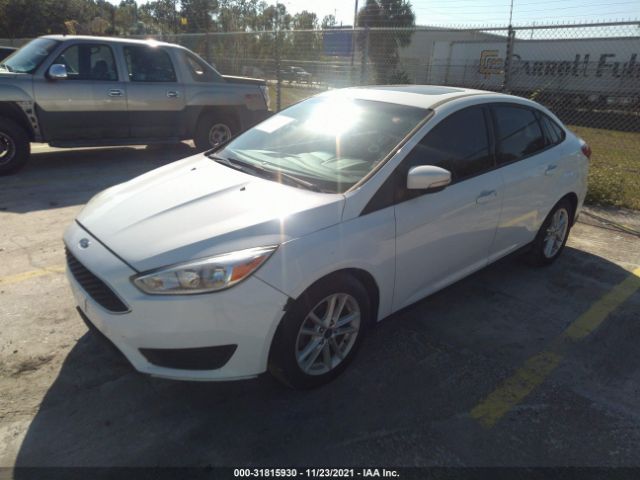 Photo 1 VIN: 1FADP3F22GL338537 - FORD FOCUS 