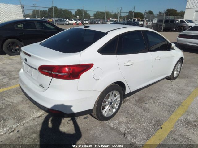 Photo 3 VIN: 1FADP3F22GL338537 - FORD FOCUS 