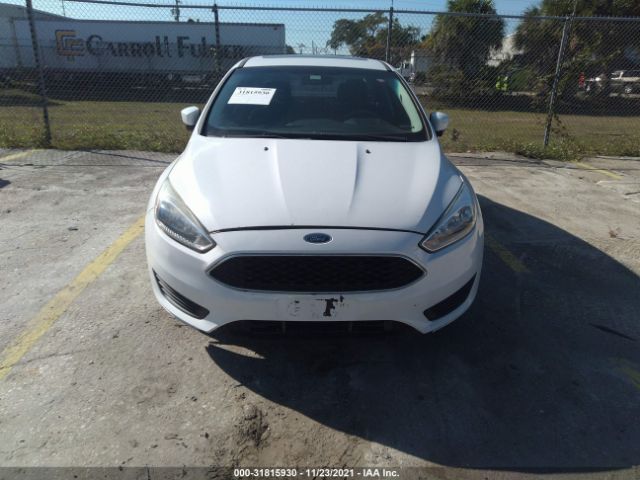 Photo 5 VIN: 1FADP3F22GL338537 - FORD FOCUS 