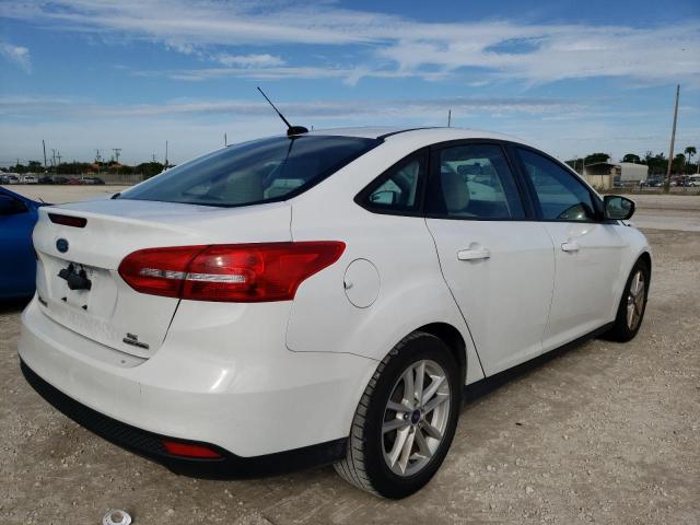 Photo 3 VIN: 1FADP3F22GL339090 - FORD FOCUS SE 