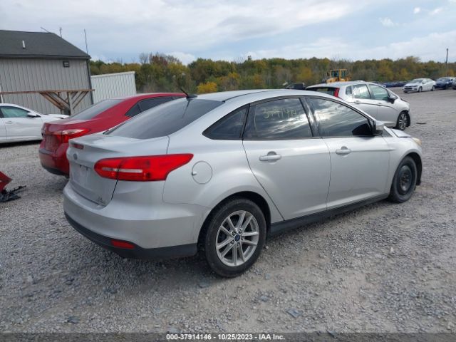 Photo 3 VIN: 1FADP3F22GL340949 - FORD FOCUS 