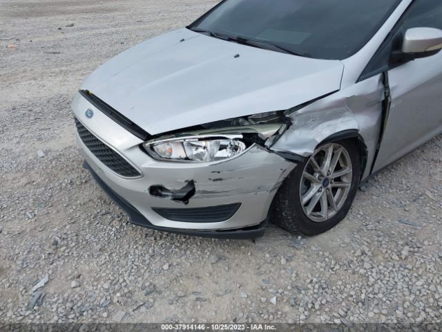 Photo 5 VIN: 1FADP3F22GL340949 - FORD FOCUS 