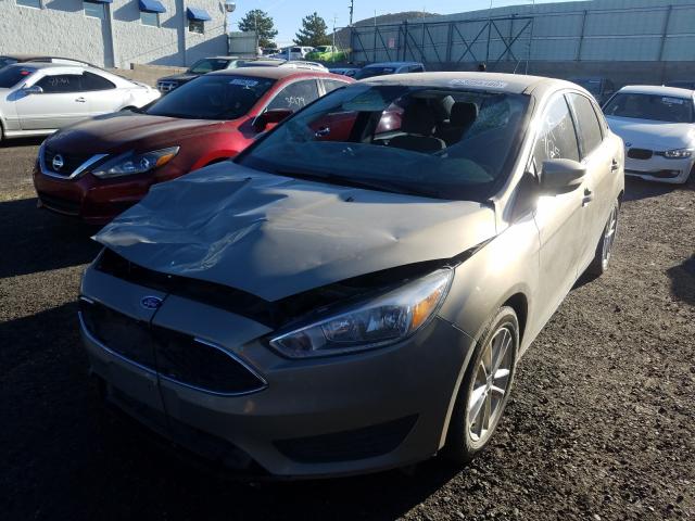 Photo 1 VIN: 1FADP3F22GL352650 - FORD FOCUS SE 