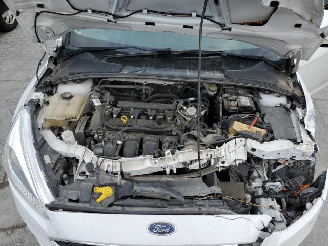 Photo 10 VIN: 1FADP3F22GL369013 - FORD FOCUS SE 