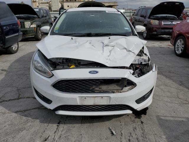 Photo 4 VIN: 1FADP3F22GL369013 - FORD FOCUS SE 