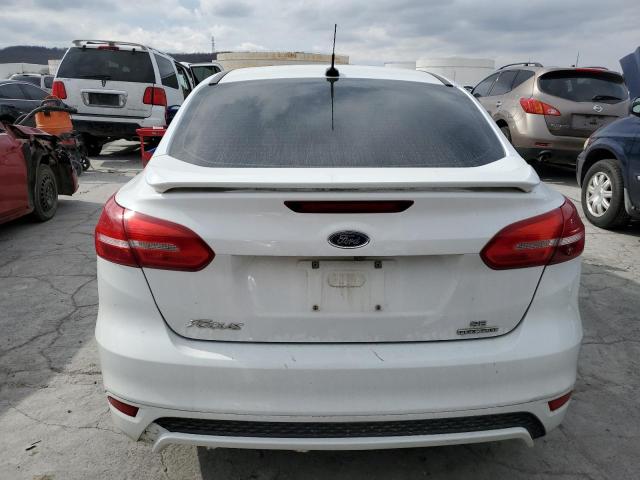 Photo 5 VIN: 1FADP3F22GL369013 - FORD FOCUS SE 