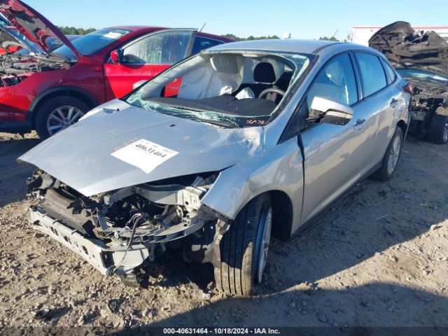 Photo 1 VIN: 1FADP3F22GL371165 - FORD FOCUS 