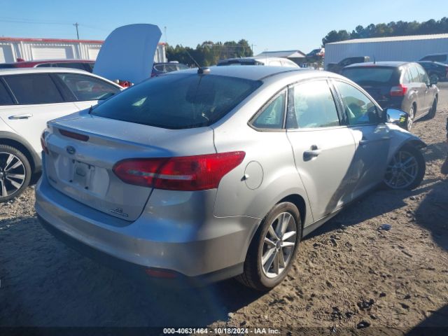 Photo 3 VIN: 1FADP3F22GL371165 - FORD FOCUS 