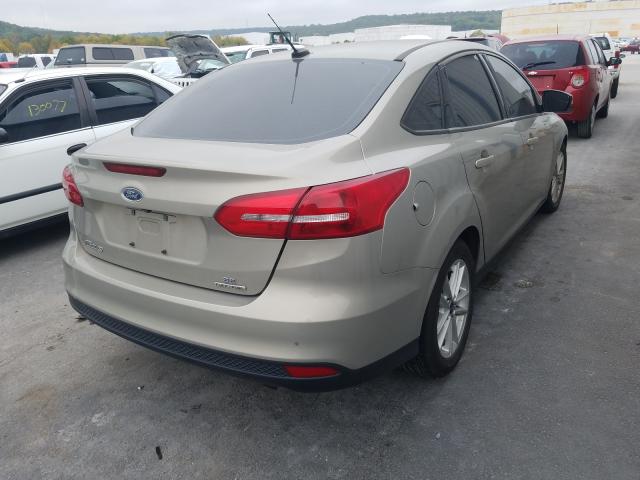 Photo 3 VIN: 1FADP3F22GL374874 - FORD FOCUS SE 