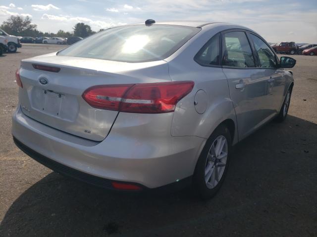 Photo 3 VIN: 1FADP3F22GL375636 - FORD FOCUS 