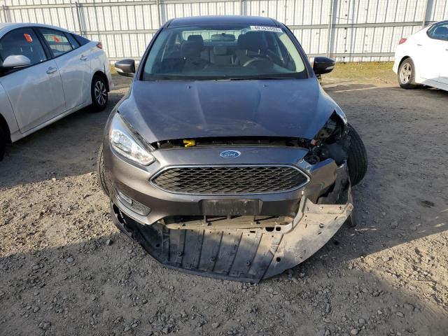 Photo 4 VIN: 1FADP3F22GL384272 - FORD FOCUS SE 