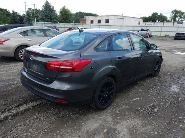 Photo 3 VIN: 1FADP3F22GL385051 - FORD FOCUS 