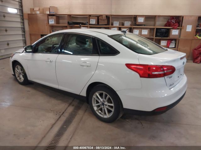 Photo 2 VIN: 1FADP3F22GL386197 - FORD FOCUS 