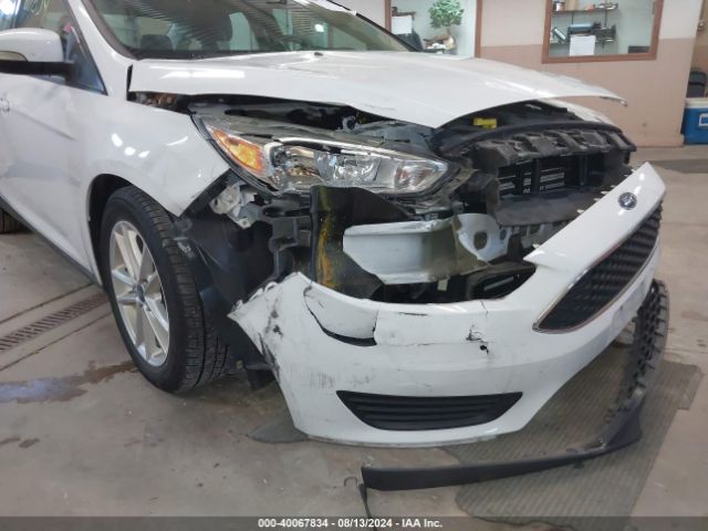 Photo 5 VIN: 1FADP3F22GL386197 - FORD FOCUS 