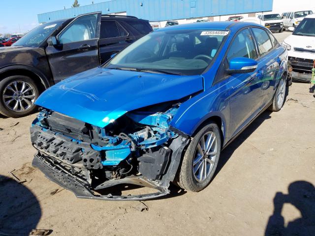 Photo 1 VIN: 1FADP3F22GL386796 - FORD FOCUS 