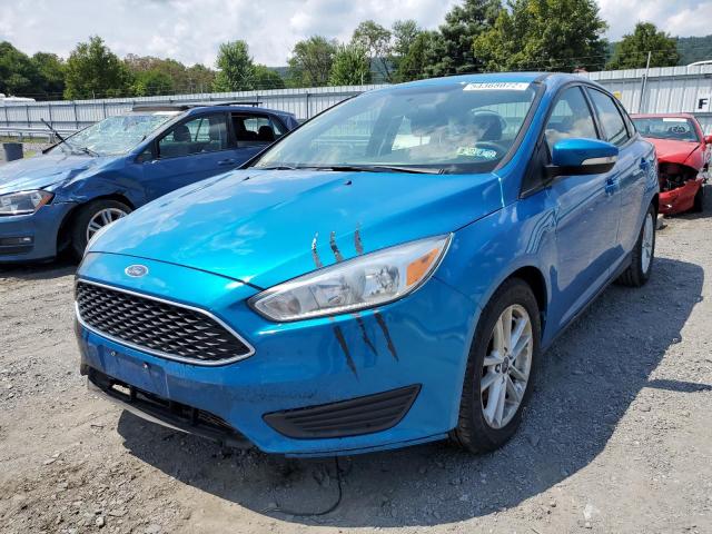 Photo 1 VIN: 1FADP3F22GL390086 - FORD FOCUS SE 