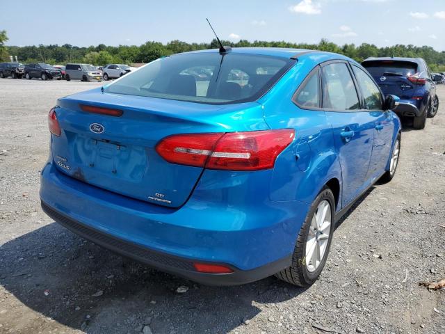 Photo 3 VIN: 1FADP3F22GL390086 - FORD FOCUS SE 